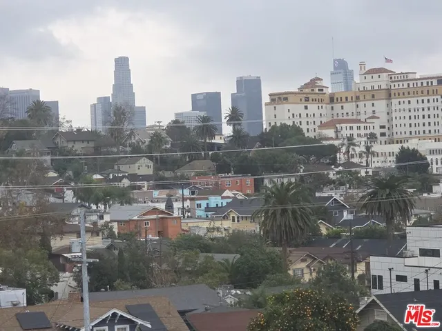 a view of a city with tall buildings