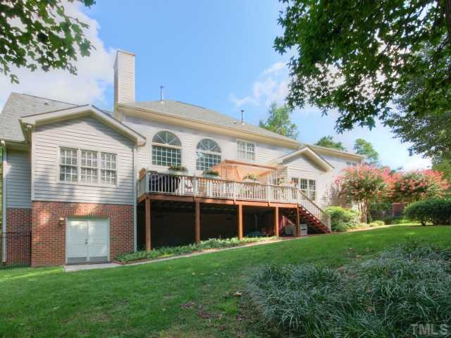 313 Carpathian Way Raleigh, NC 27615 - Photo 21 of 25 Exterior rear view of the home. Access workshop through the double doors. Exterior Back