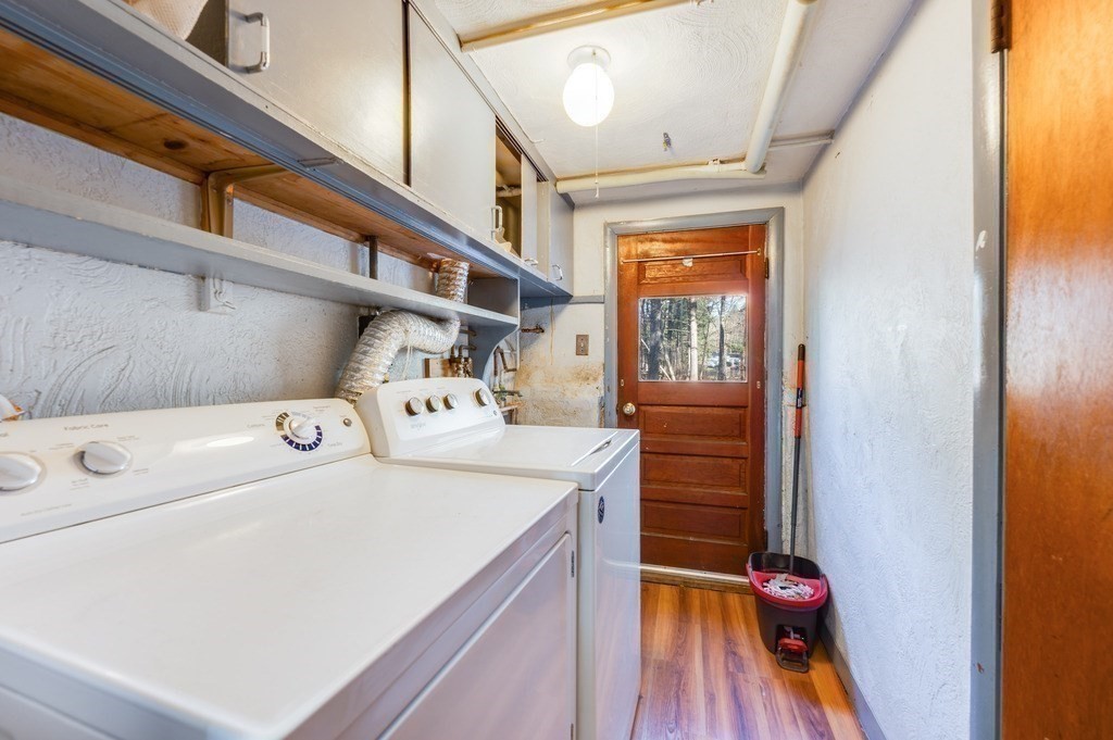 250 Hudson Road Sudbury, MA 01776 - Photo 7 of 19 a utility room with dryer and washer