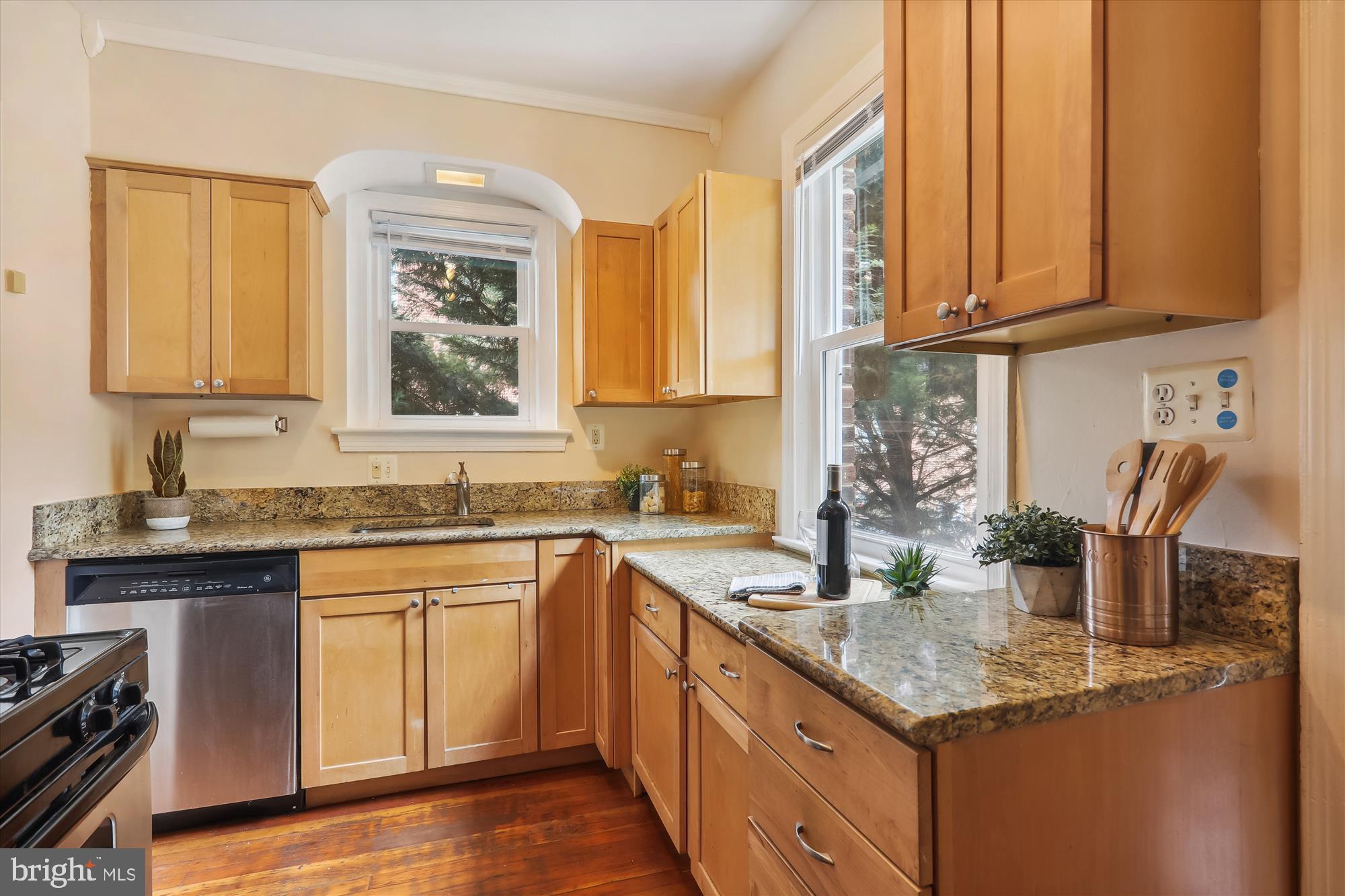 1373 Tuckerman Street Northwest Washington, DC 20011 - Photo 15 of 27 a kitchen with stainless steel appliances granite countertop a sink and cabinets