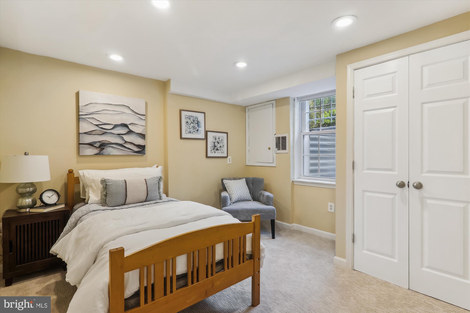 1373 Tuckerman Street Northwest Washington, DC 20011 - Photo 18 of 27 a bedroom with a bed and a painting on the wall