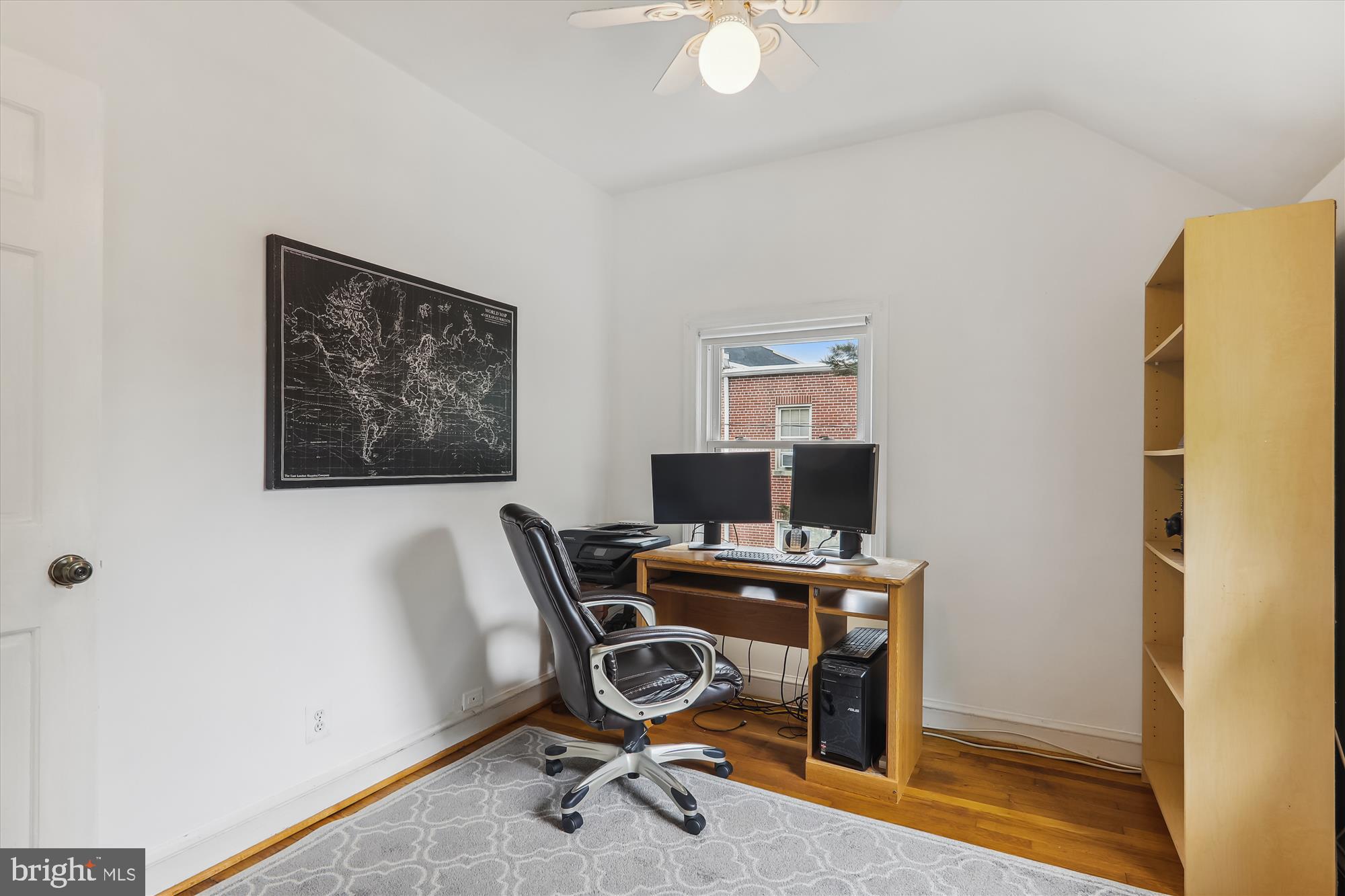 1373 Tuckerman Street Northwest Washington, DC 20011 - Photo 23 of 27 a view of a workspace with furniture and a window