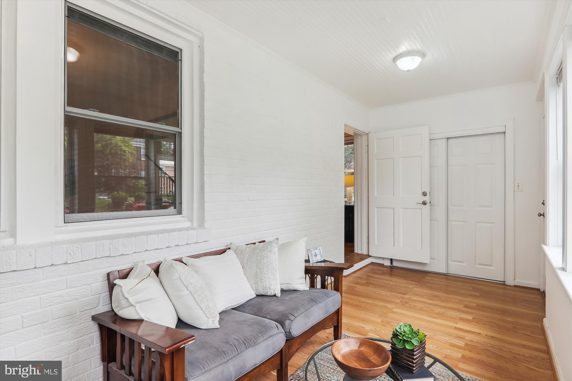 1373 Tuckerman Street Northwest Washington, DC 20011 - Photo 5 of 27 a living room with furniture and wooden floor