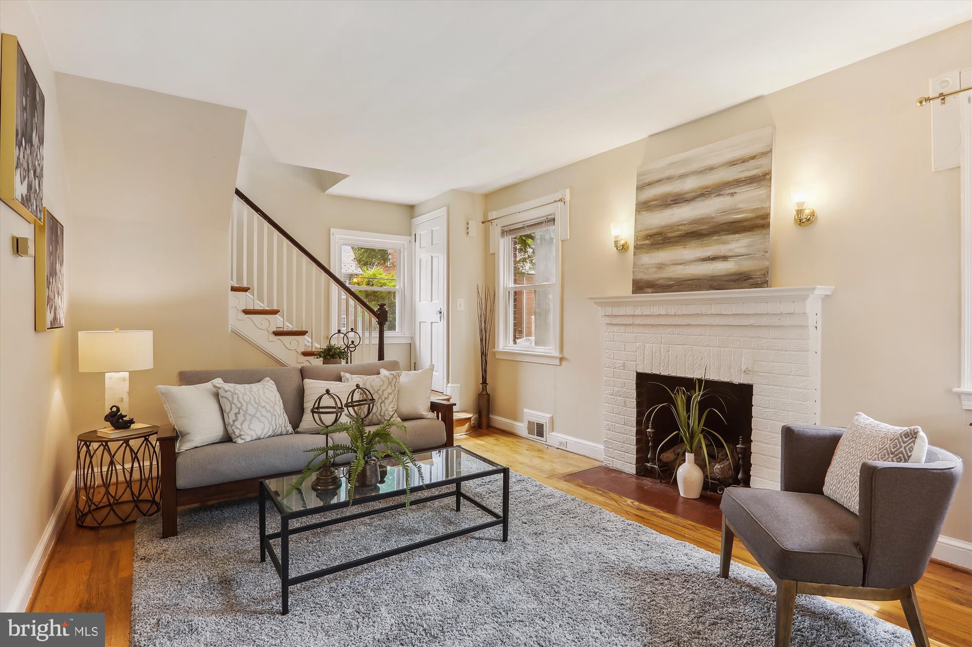1373 Tuckerman Street Northwest Washington, DC 20011 - Photo 6 of 27 a living room with furniture and a fireplace