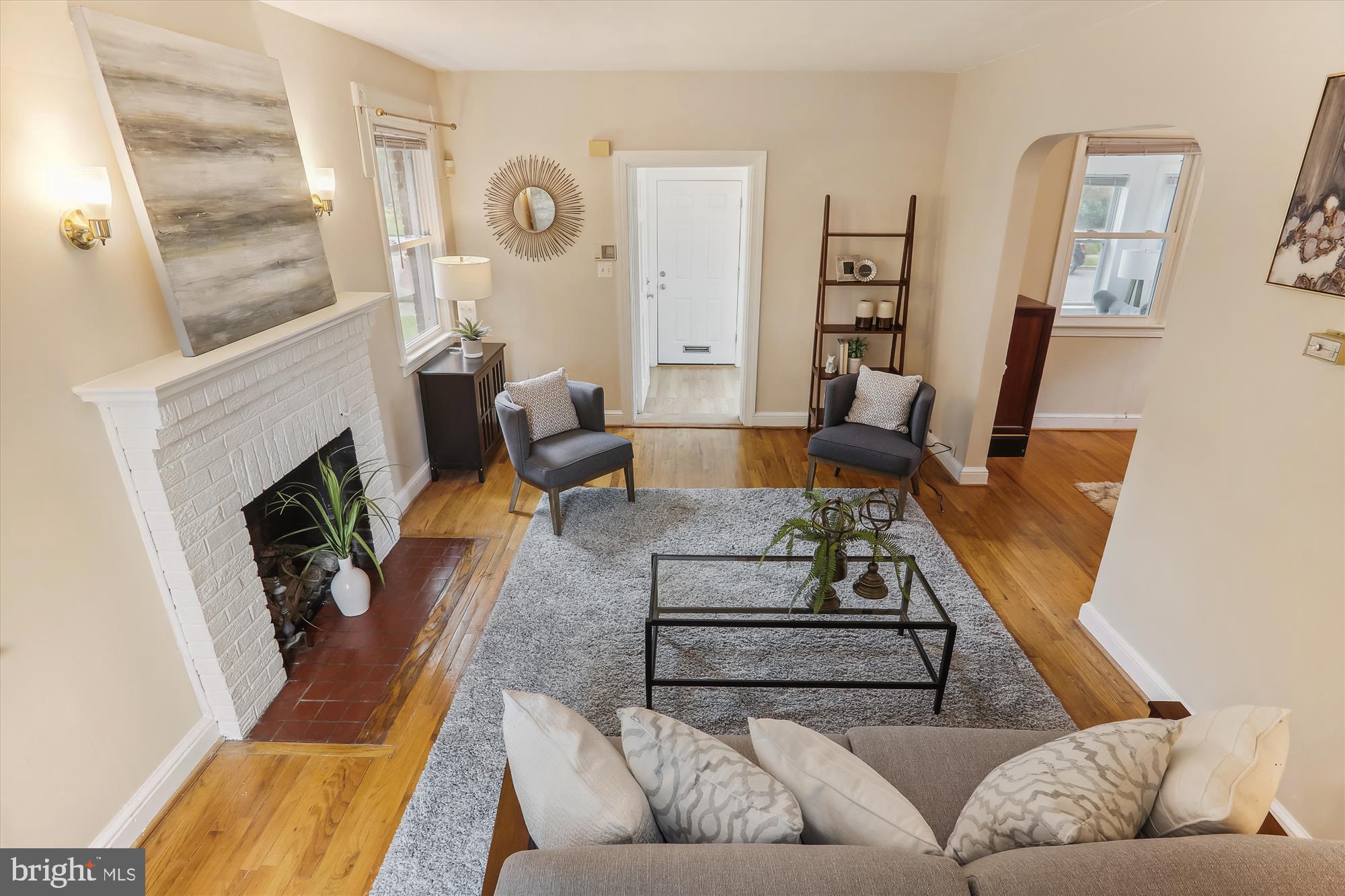 1373 Tuckerman Street Northwest Washington, DC 20011 - Photo 7 of 27 a living room with furniture and a fireplace