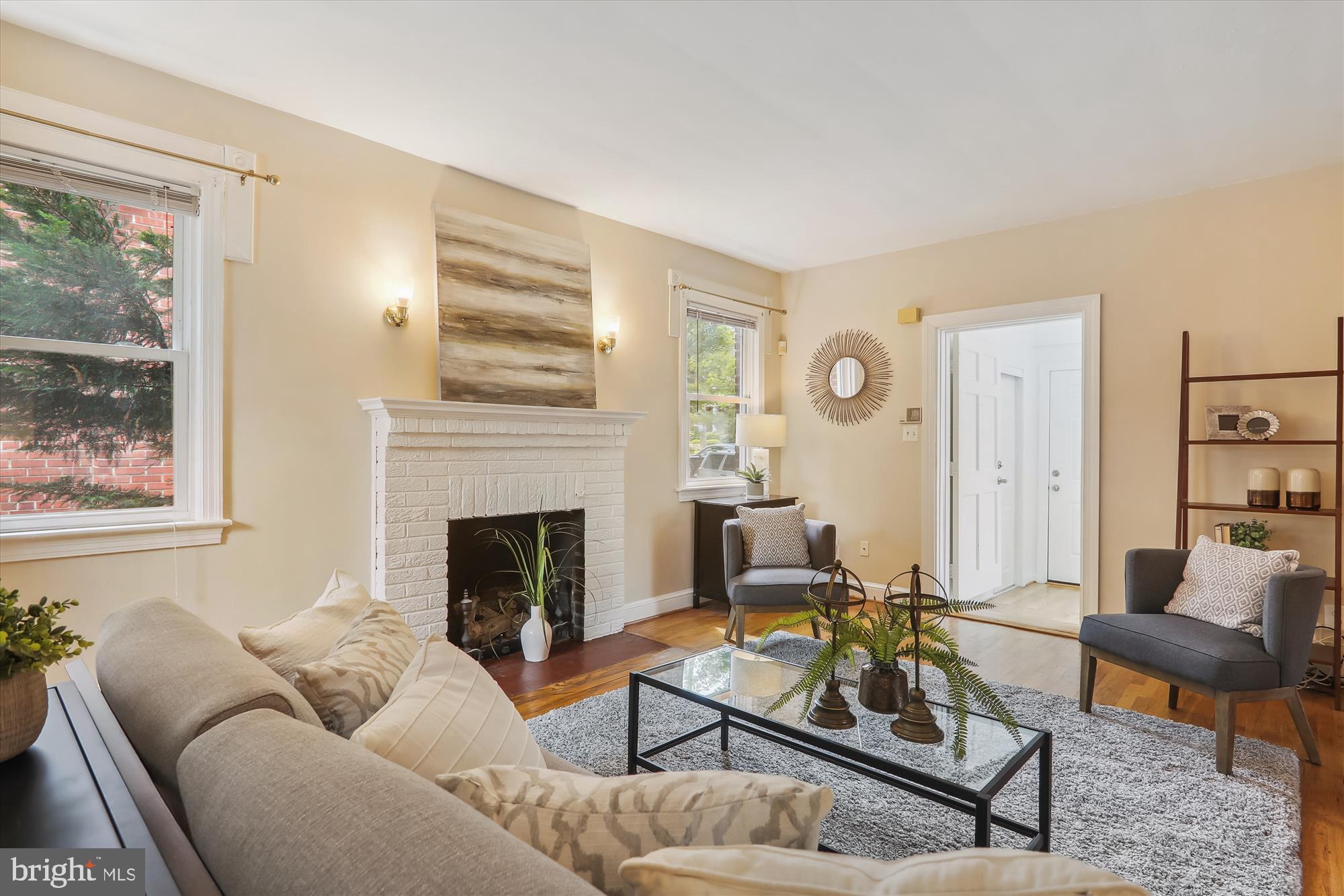 1373 Tuckerman Street Northwest Washington, DC 20011 - Photo 8 of 27 a living room with furniture and a fireplace