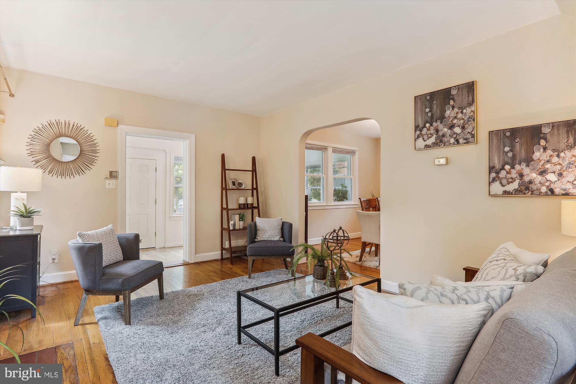 1373 Tuckerman Street Northwest Washington, DC 20011 - Photo 10 of 27 a living room with furniture and a wooden floor