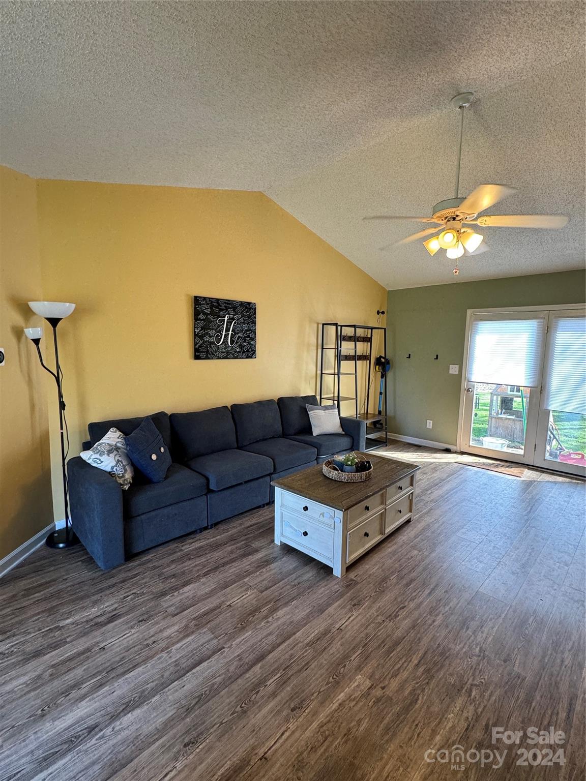 445 Stone Road Salisbury, NC 28146 - Photo 3 of 22 a living room with furniture and a wooden floor