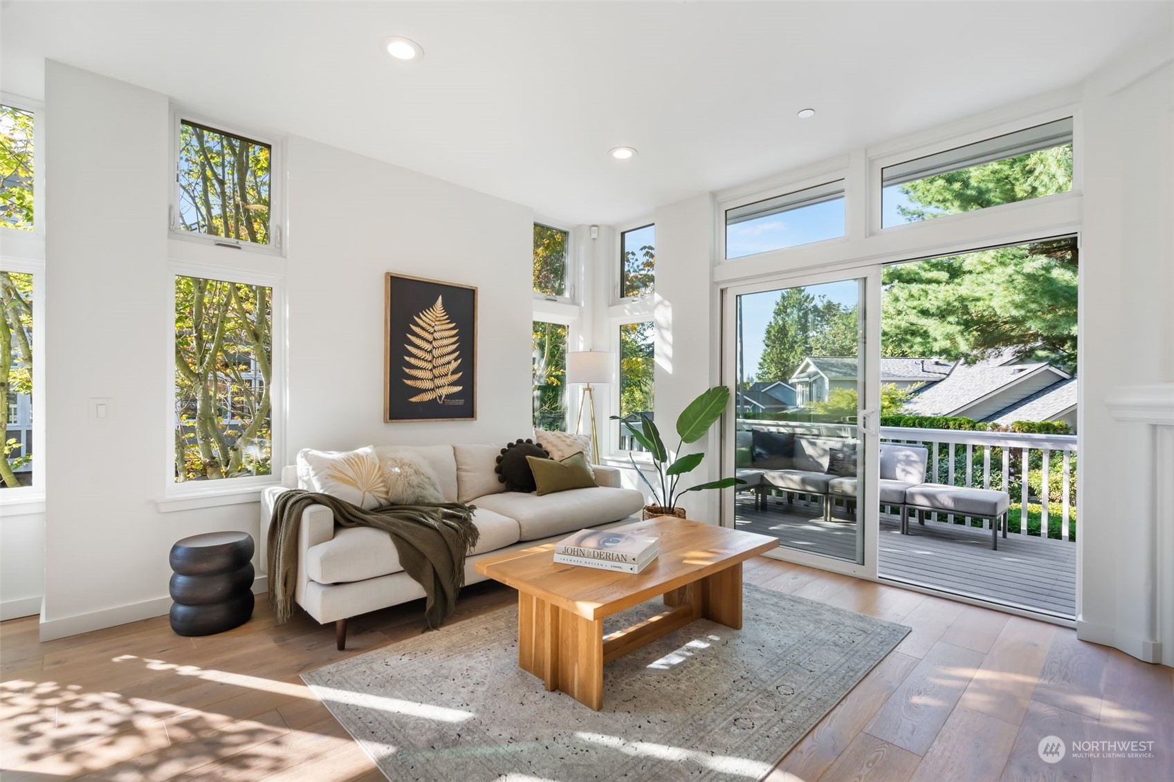 202 5th Place South Kirkland, WA 98033 - Photo 1 of 40 a living room with furniture and a table