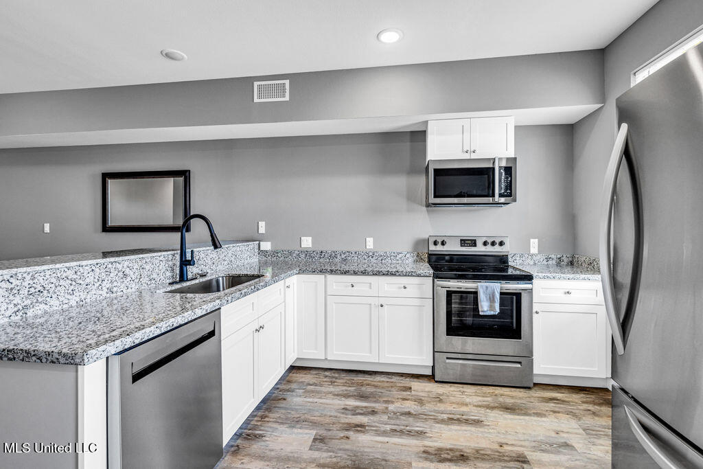 112 East Orchard Loop, Unit 112 D'Iberville, MS 39540 - Photo 7 of 20 112OrchardLoop-8