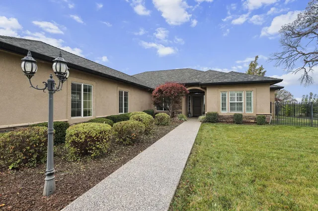 a backyard of a house with lots of green space