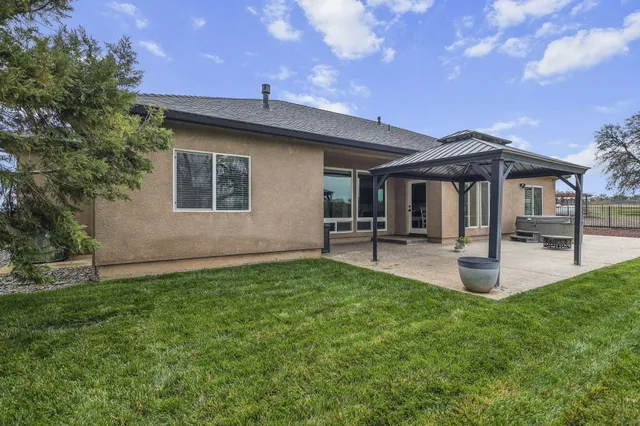 an aerial view of a house with a garden