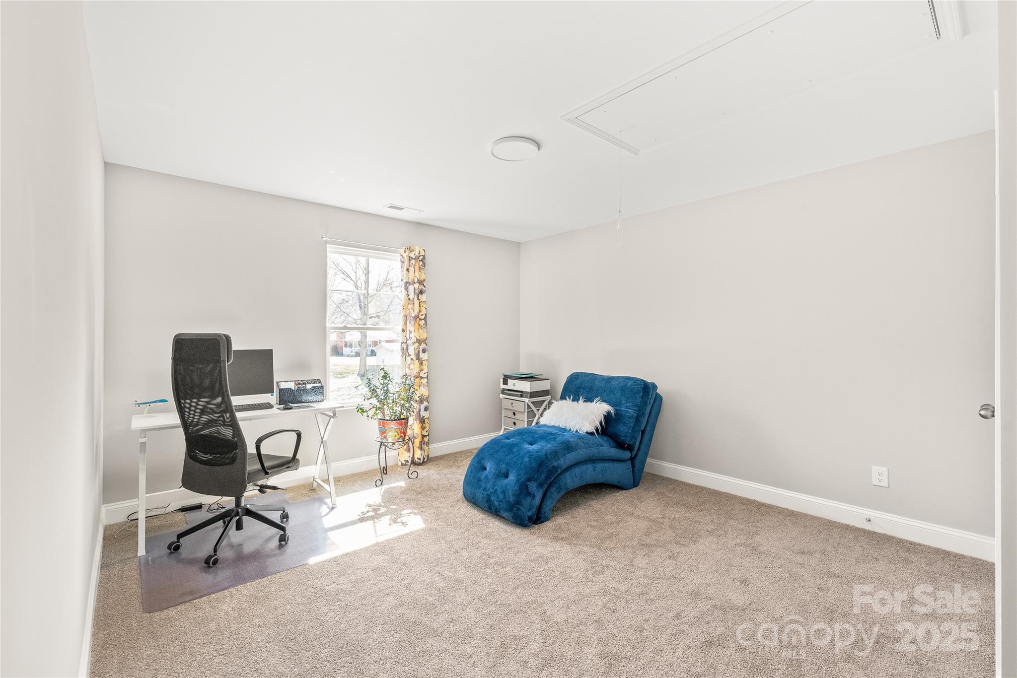 2116 Wilson Avenue Monroe, NC 28110 - Photo 14 of 21 a livingroom with workspace and a window