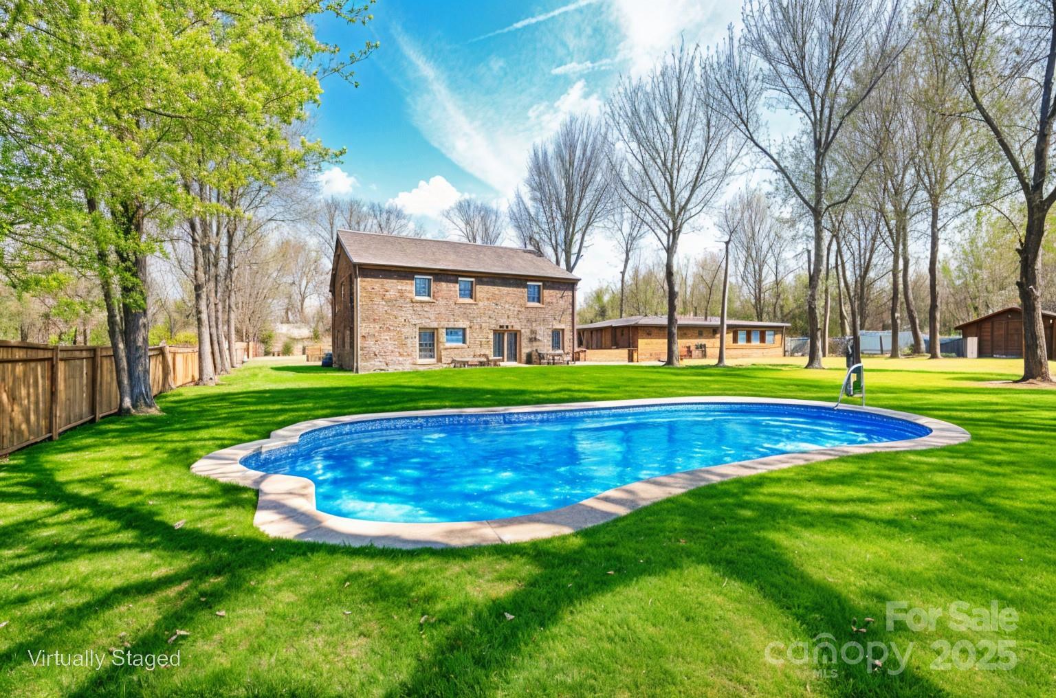 2116 Wilson Avenue Monroe, NC 28110 - Photo 21 of 21 a view of yard with swimming pool and green space