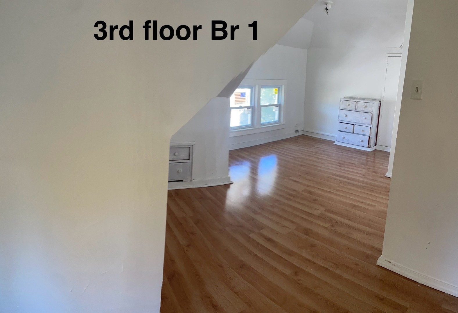 136 John Street DeKalb, IL 60115 - Photo 12 of 19 wooden floor in an empty room