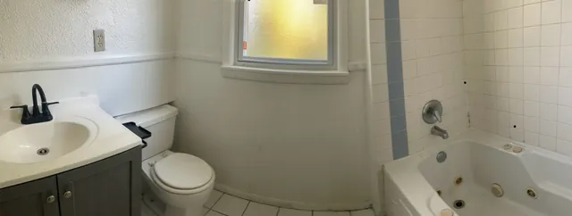 a bathroom with a sink and a toilet