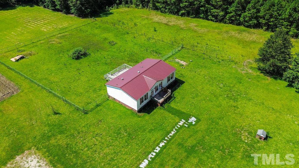 a view of a lush green space