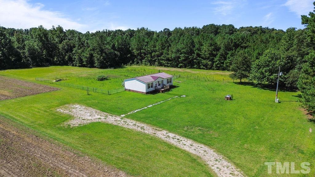 92 Wayland Drive St. Pauls, NC 28384 - Photo 29 of 36 a view of a golf course with a garden