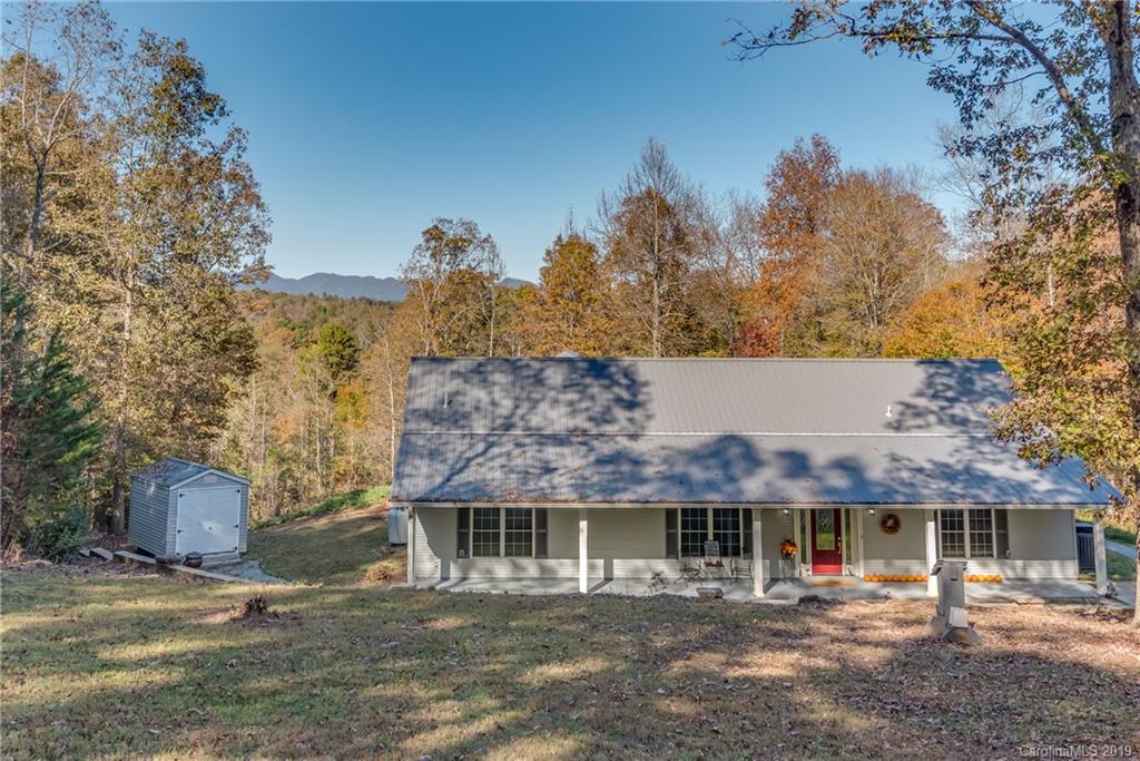 1020 Mountain Creek Road Rutherfordton, NC 28139 - Photo 17 of 48 a front view of a building with a garden