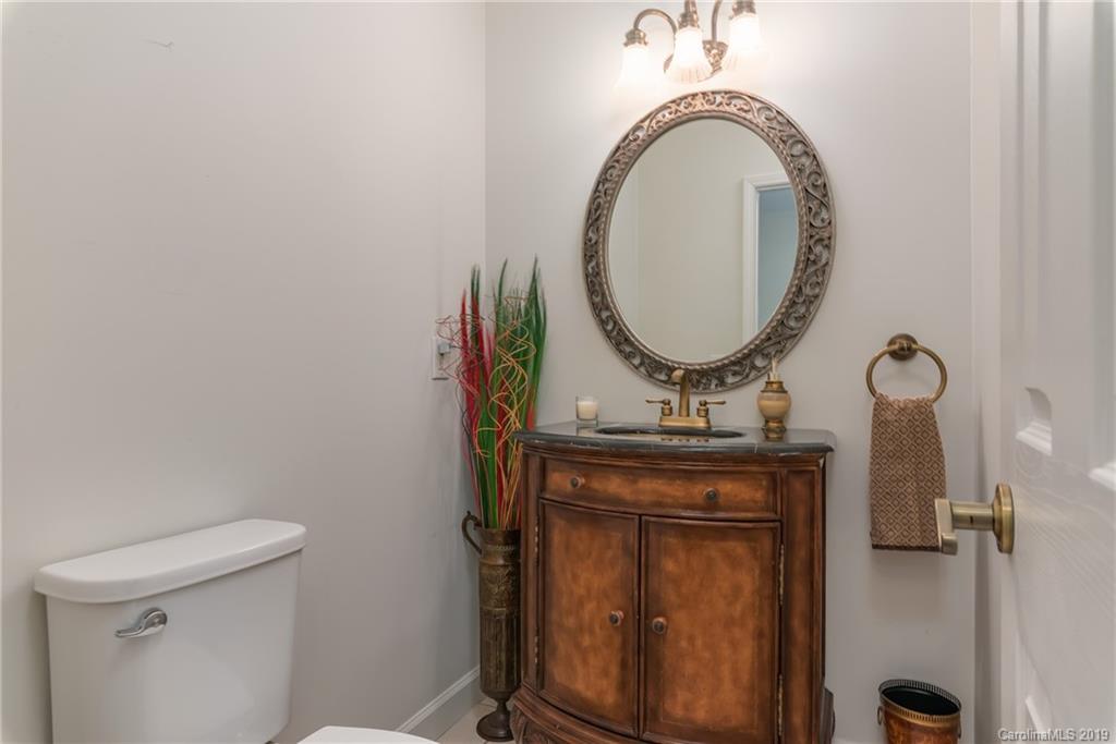 1020 Mountain Creek Road Rutherfordton, NC 28139 - Photo 20 of 48 a bathroom with a sink and a mirror