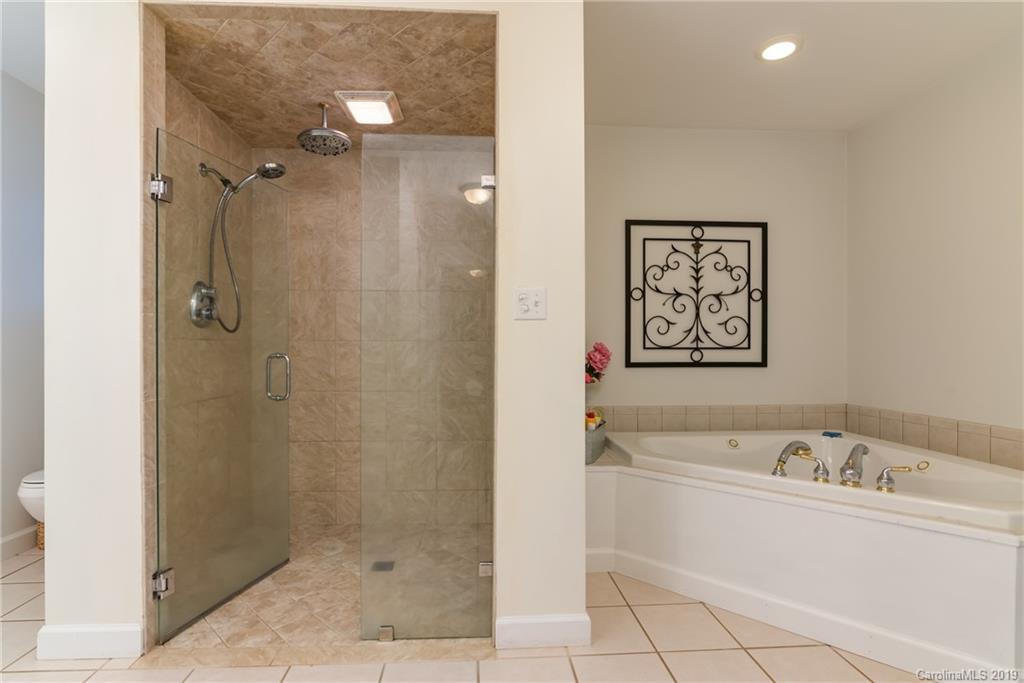 1020 Mountain Creek Road Rutherfordton, NC 28139 - Photo 40 of 48 a bathroom with a bathtub and shower