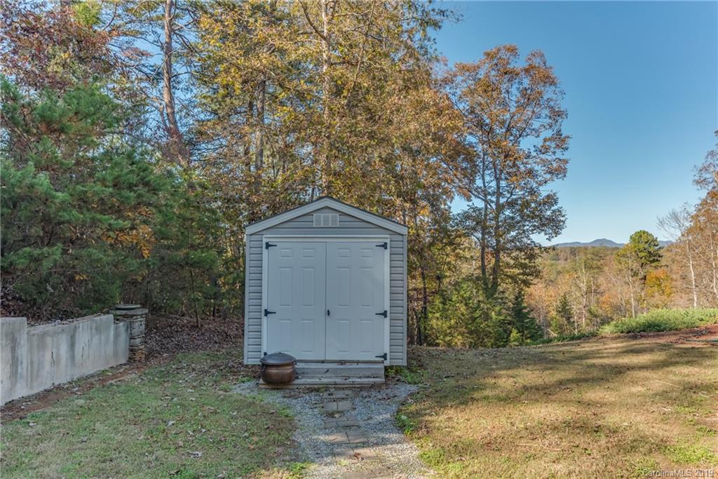 1020 Mountain Creek Road Rutherfordton, NC 28139 - Photo 8 of 48 a house with trees in the background