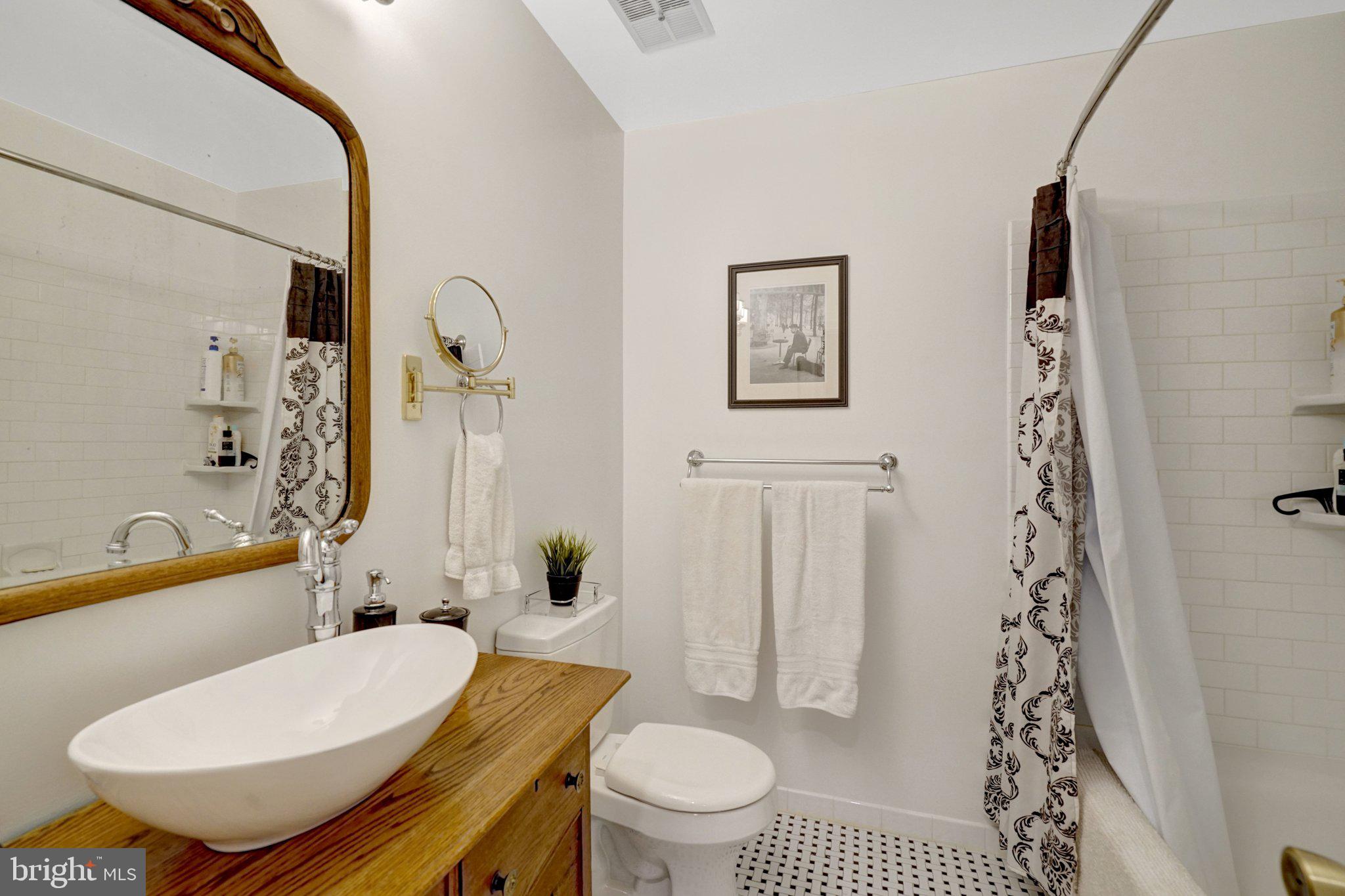 8224 Stacey Road Alexandria, VA 22308 - Photo 54 of 79 Hall bathroom/upper level