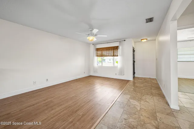 a kitchen with stainless steel appliances a stove sink and microwave