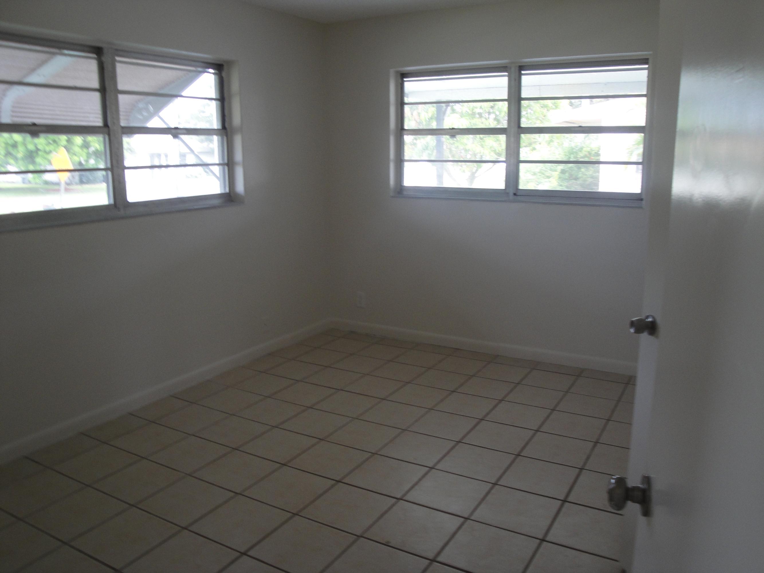1403 High Ridge Road Lake Worth, FL 33461 - Photo 6 of 9 Master Bedroom