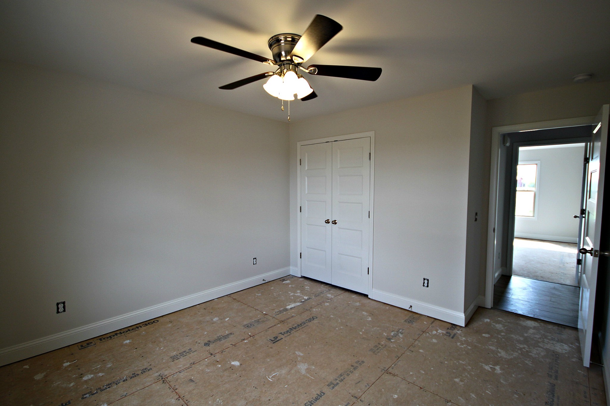 4112 Dot Road Springfield, TN 37172 - Photo 13 of 15 an empty room with closet and a chandelier fan