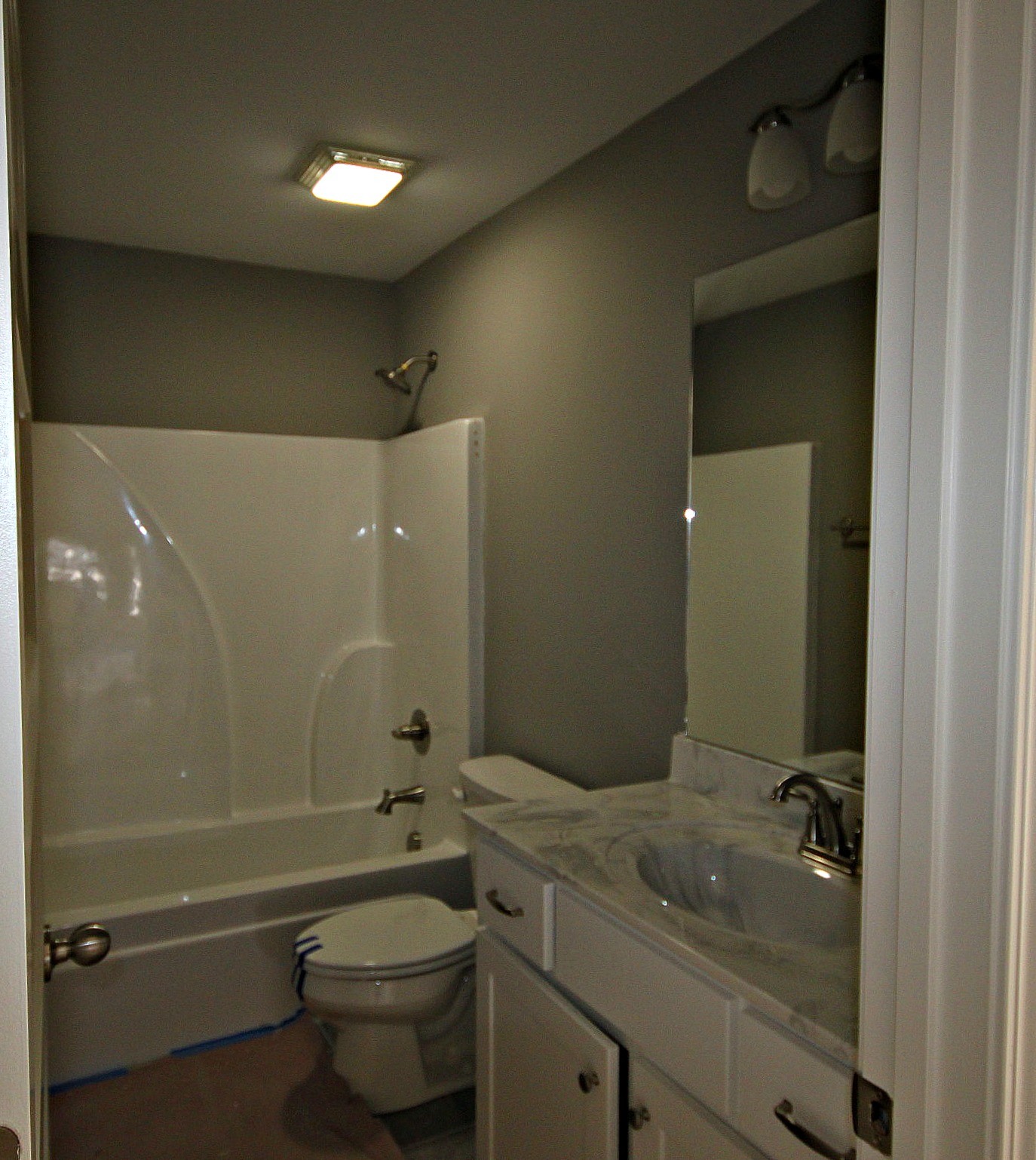 4112 Dot Road Springfield, TN 37172 - Photo 15 of 15 a bathroom with a granite countertop sink a toilet and shower