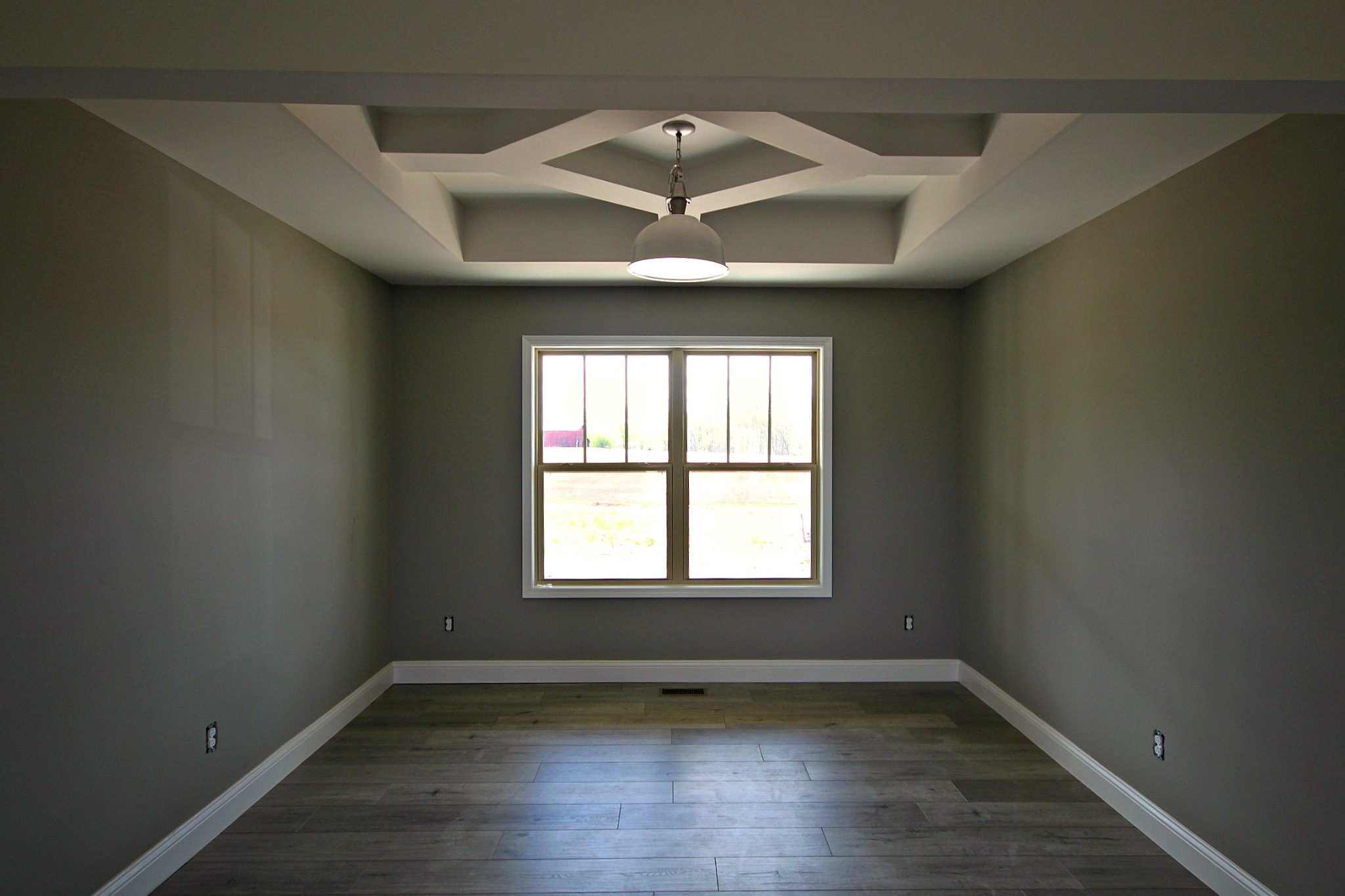 4112 Dot Road Springfield, TN 37172 - Photo 8 of 15 a view of an empty room with wooden floor and a window