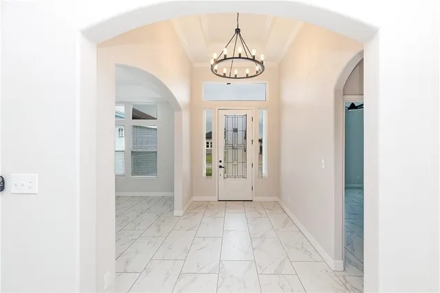 a view of an entryway with sitting space