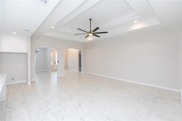 a view of a livingroom with a ceiling fan