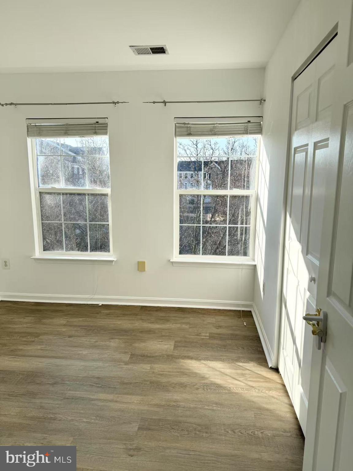 21764 Goose Cross Terrace Ashburn, VA 20147 - Photo 12 of 21 a view of an empty room with a window