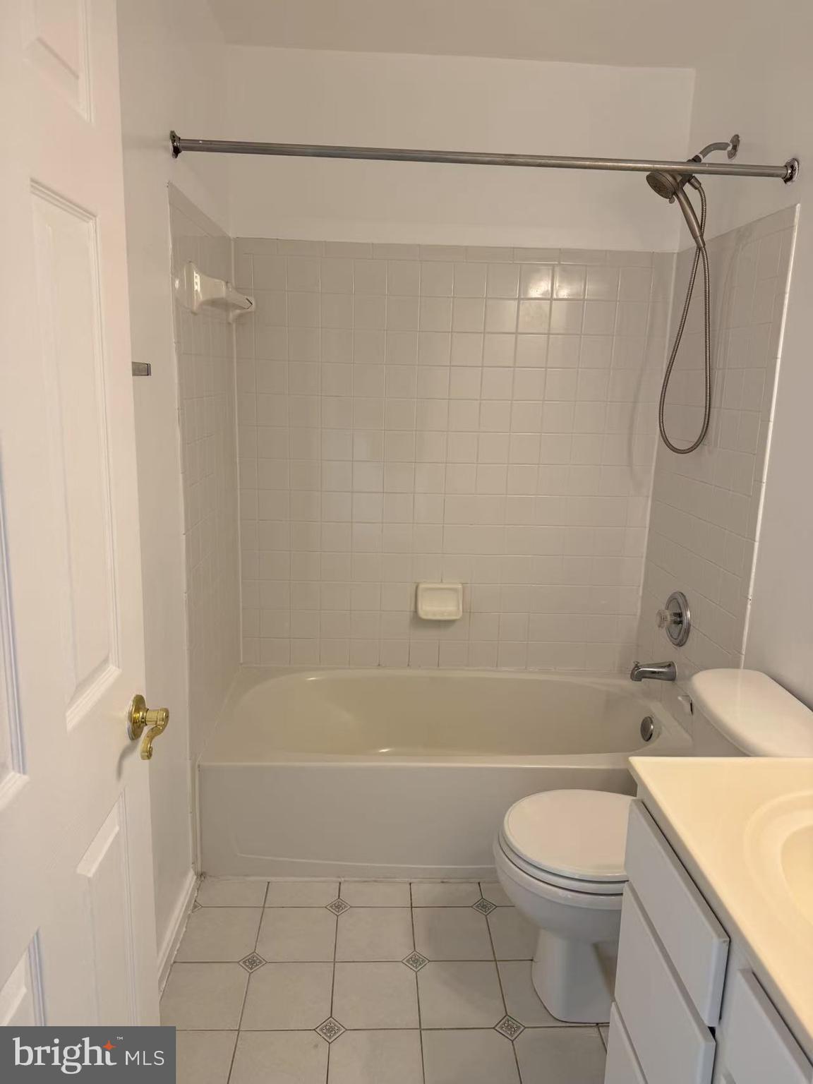 21764 Goose Cross Terrace Ashburn, VA 20147 - Photo 13 of 21 a bathroom with a shower a bathtub and a toilet