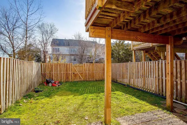 a view of a backyard with a barn