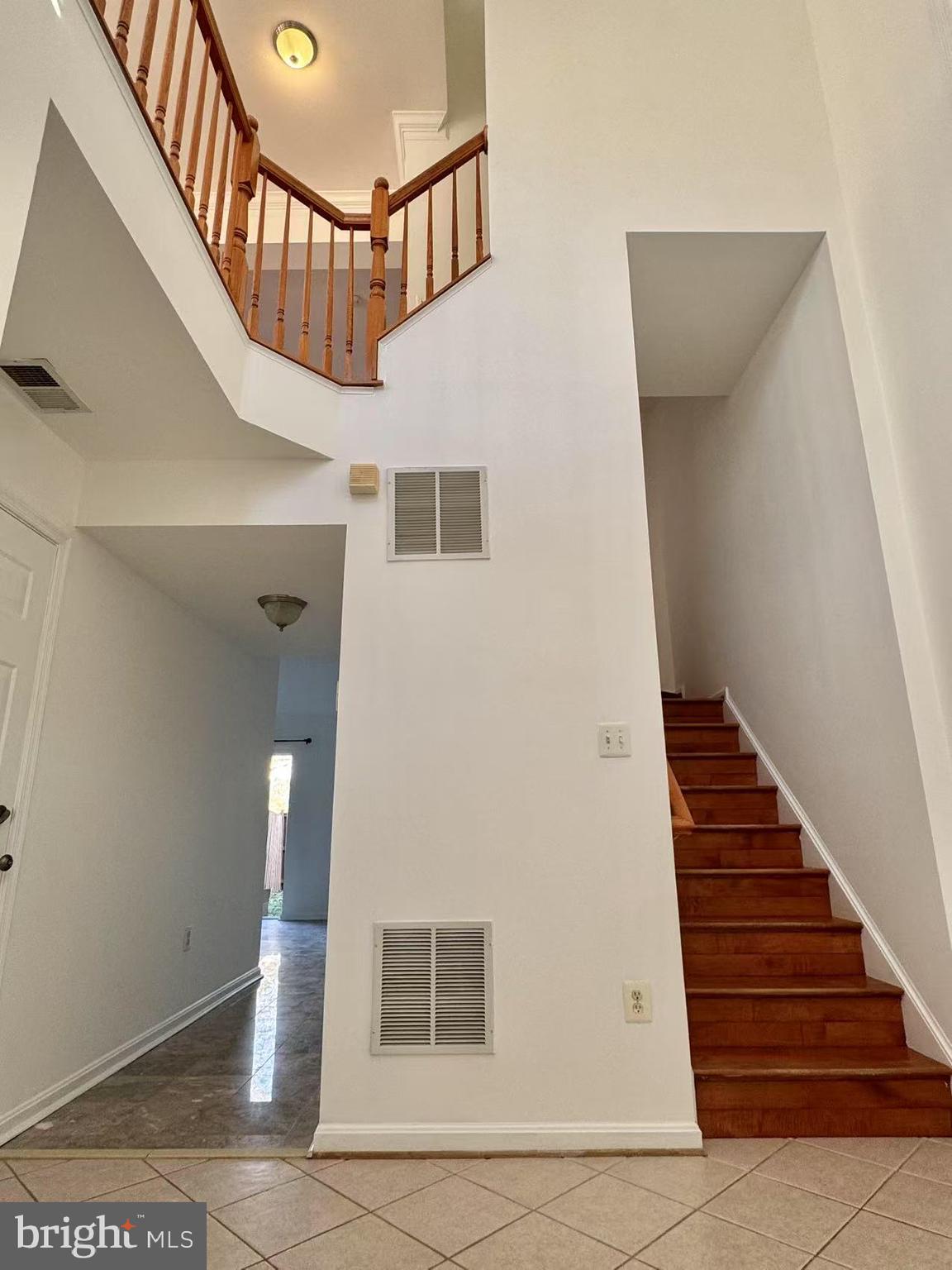 21764 Goose Cross Terrace Ashburn, VA 20147 - Photo 2 of 21 a view of entryway and hall with wooden floor