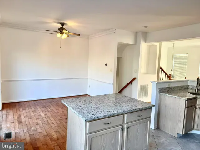 a kitchen with a counter space and a sink