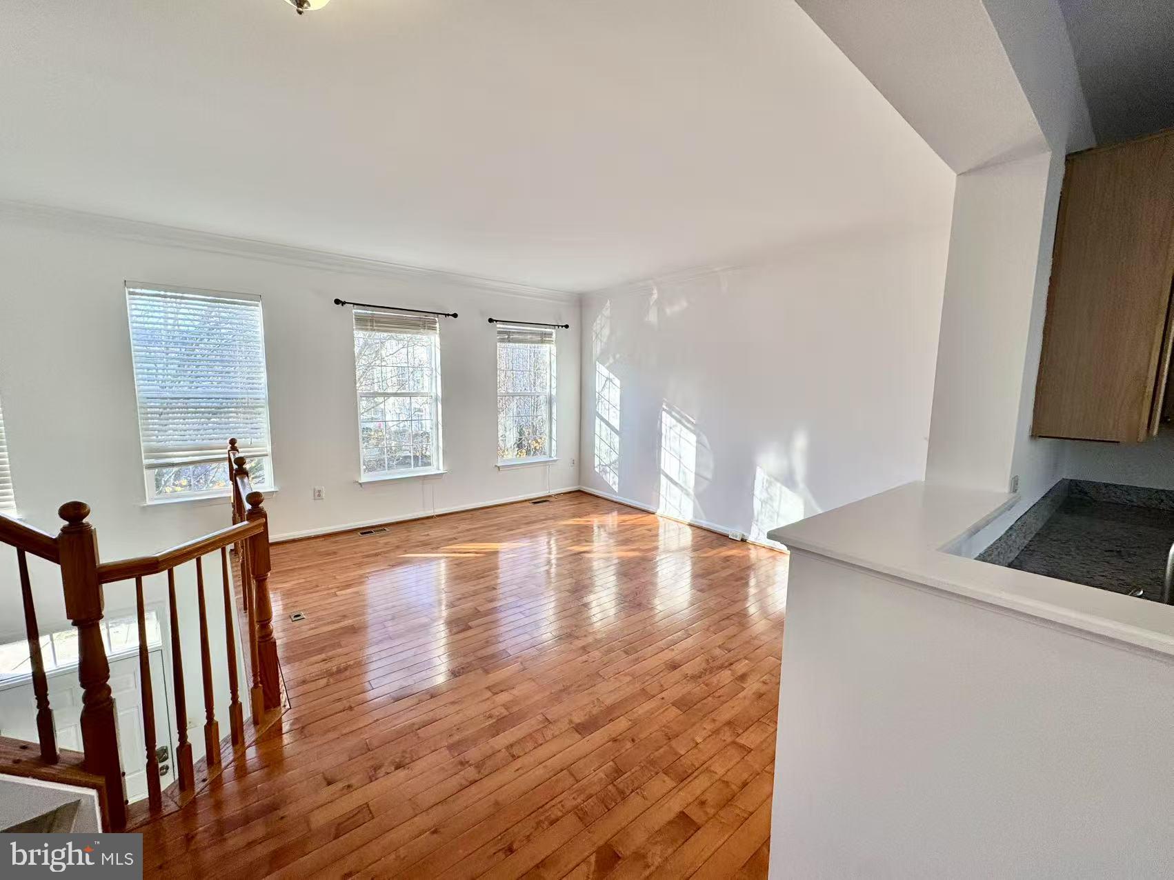 21764 Goose Cross Terrace Ashburn, VA 20147 - Photo 7 of 21 a view of empty room with wooden floor and fan
