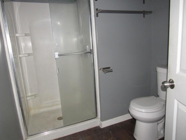 25 Ben Lomond Street Uniontown, PA 15401 - Photo 4 of 24 a bathroom with a toilet and a shower