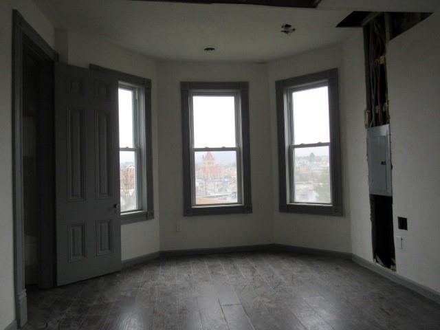25 Ben Lomond Street Uniontown, PA 15401 - Photo 7 of 24 an empty room with windows