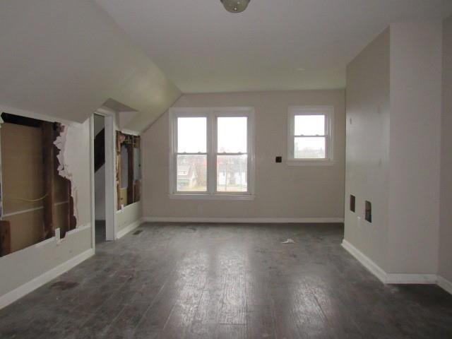 25 Ben Lomond Street Uniontown, PA 15401 - Photo 10 of 24 an empty room with wooden floor and windows
