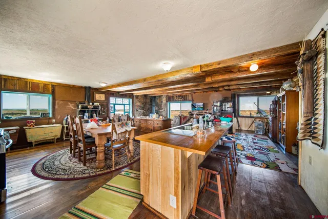 a room with lots of chairs and a table