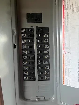 a table with chairs and a stove