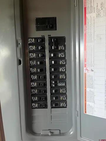 a table with chairs and a stove