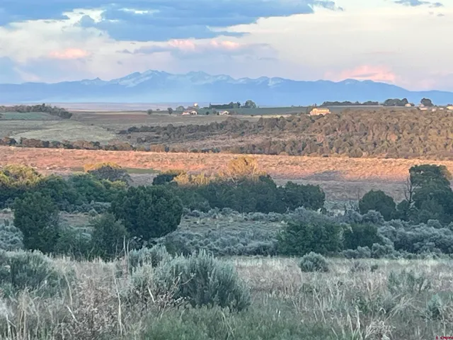 a view of a lake with a mountain