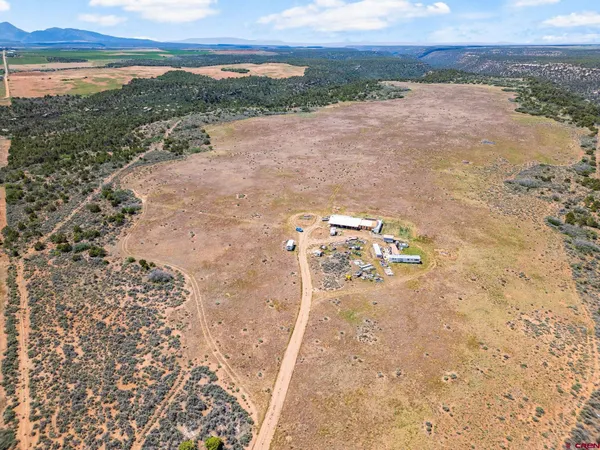 a view of a road with an ocean view