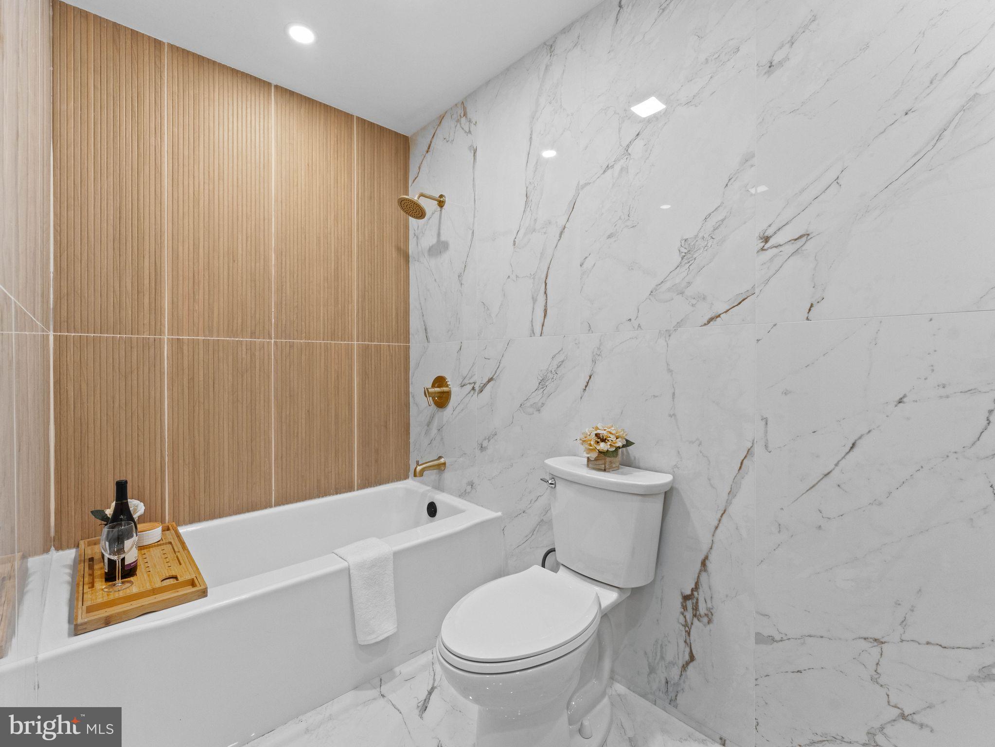 50 Tweedstone Lane Willingboro, NJ 08046 - Photo 26 of 45 a bathroom with a sink a toilet and shower