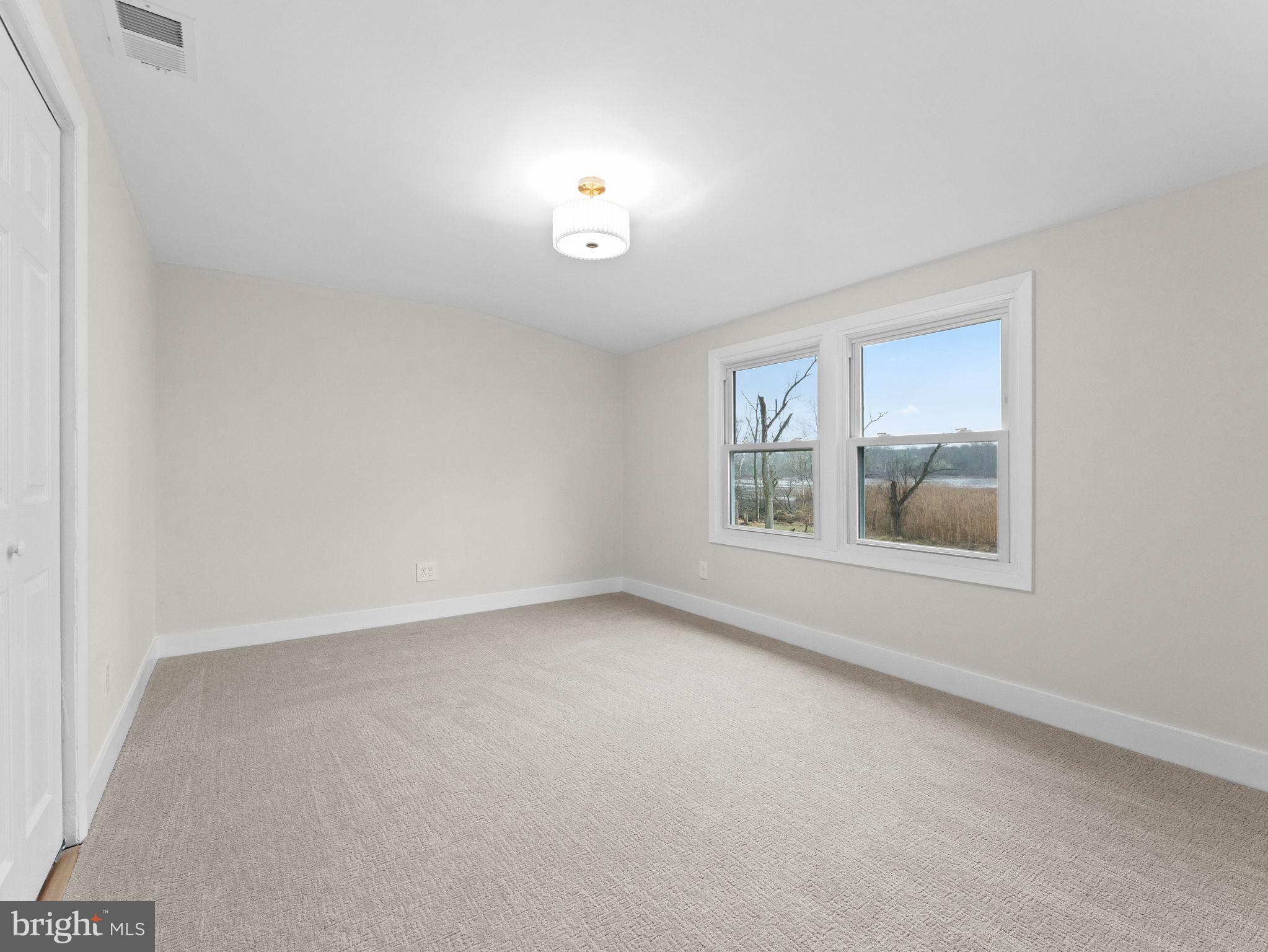50 Tweedstone Lane Willingboro, NJ 08046 - Photo 29 of 45 an empty room with a window
